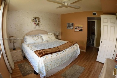 Price Improvement on this spacious top floor 2 bedroom condo in on The Country Club At Boca Raton in Florida - for sale on GolfHomes.com, golf home, golf lot