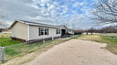 Embrace the charm of lakeside living with this impressive on Links At Lands End in Texas - for sale on GolfHomes.com, golf home, golf lot