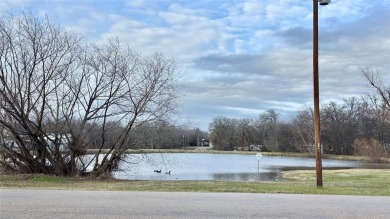 Embrace the charm of lakeside living with this impressive on Links At Lands End in Texas - for sale on GolfHomes.com, golf home, golf lot