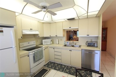 Spacious 2-bedroom, 2-bathroom condo on the 3rd floor features on Wynmoor Golf Course in Florida - for sale on GolfHomes.com, golf home, golf lot