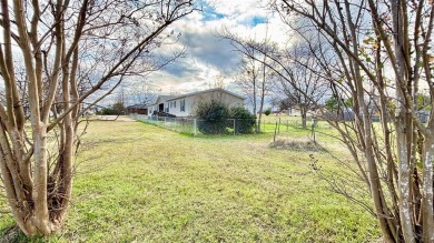 Embrace the charm of lakeside living with this impressive on Links At Lands End in Texas - for sale on GolfHomes.com, golf home, golf lot