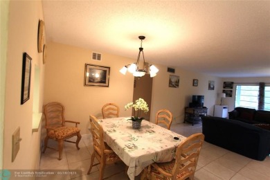 Spacious 2-bedroom, 2-bathroom condo on the 3rd floor features on Wynmoor Golf Course in Florida - for sale on GolfHomes.com, golf home, golf lot