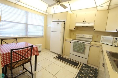 Spacious 2-bedroom, 2-bathroom condo on the 3rd floor features on Wynmoor Golf Course in Florida - for sale on GolfHomes.com, golf home, golf lot