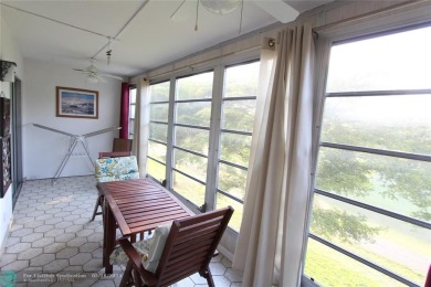 Spacious 2-bedroom, 2-bathroom condo on the 3rd floor features on Wynmoor Golf Course in Florida - for sale on GolfHomes.com, golf home, golf lot