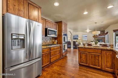 Stunning 4-bedroom, 2.5-bath home on the 4th fairway in the on Flagstaff Ranch Golf Club in Arizona - for sale on GolfHomes.com, golf home, golf lot