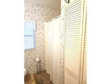 Welcome to 290 Doubles Lane, located in the 55+ Coop Regal Ridge on Deer Creek RV Golf Resort in Florida - for sale on GolfHomes.com, golf home, golf lot