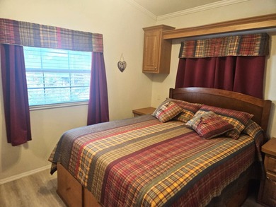 Welcome to 290 Doubles Lane, located in the 55+ Coop Regal Ridge on Deer Creek RV Golf Resort in Florida - for sale on GolfHomes.com, golf home, golf lot