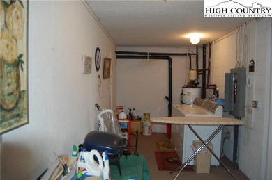 Nestled in the rhododendrons, you'll find this 2bdr/2bath on Land Harbor Golf Course in North Carolina - for sale on GolfHomes.com, golf home, golf lot