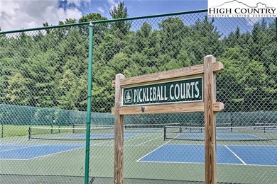 Nestled in the rhododendrons, you'll find this 2bdr/2bath on Land Harbor Golf Course in North Carolina - for sale on GolfHomes.com, golf home, golf lot