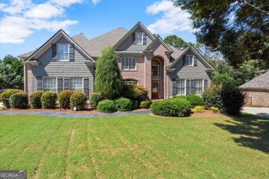 Welcome to this stunning 7-bedroom, 5.5-bathroom home boasting 6 on Bridgemill Golf Club in Georgia - for sale on GolfHomes.com, golf home, golf lot