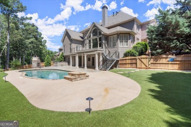 Welcome to this stunning 7-bedroom, 5.5-bathroom home boasting 6 on Bridgemill Golf Club in Georgia - for sale on GolfHomes.com, golf home, golf lot