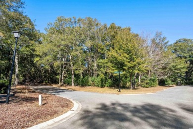 Nestled in the heart of Pawleys Plantation, this private corner on Pawleys Plantation Golf and Country Club in South Carolina - for sale on GolfHomes.com, golf home, golf lot