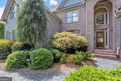 Welcome to this stunning 7-bedroom, 5.5-bathroom home boasting 6 on Bridgemill Golf Club in Georgia - for sale on GolfHomes.com, golf home, golf lot