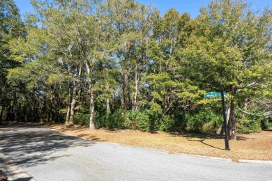 Nestled in the heart of Pawleys Plantation, this private corner on Pawleys Plantation Golf and Country Club in South Carolina - for sale on GolfHomes.com, golf home, golf lot