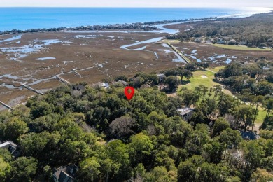 Nestled in the heart of Pawleys Plantation, this private corner on Pawleys Plantation Golf and Country Club in South Carolina - for sale on GolfHomes.com, golf home, golf lot