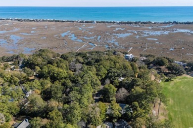 Nestled in the heart of Pawleys Plantation, this private corner on Pawleys Plantation Golf and Country Club in South Carolina - for sale on GolfHomes.com, golf home, golf lot