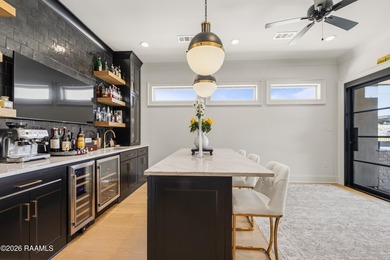 Located in the prestigious gated golf community of Le Triomphe on LeTriomphe Golf and Country Club in Louisiana - for sale on GolfHomes.com, golf home, golf lot