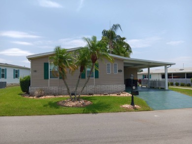 Furnished! Updated 2Bed/2Bath well-maintained Home with a on Four Lakes Golf Club in Florida - for sale on GolfHomes.com, golf home, golf lot