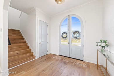 Located in the prestigious gated community of Le Triomphe Golf & on LeTriomphe Golf and Country Club in Louisiana - for sale on GolfHomes.com, golf home, golf lot