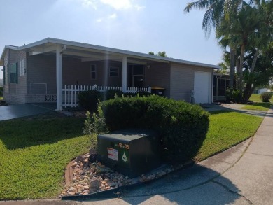 Furnished! Updated 2Bed/2Bath well-maintained Home with a on Four Lakes Golf Club in Florida - for sale on GolfHomes.com, golf home, golf lot