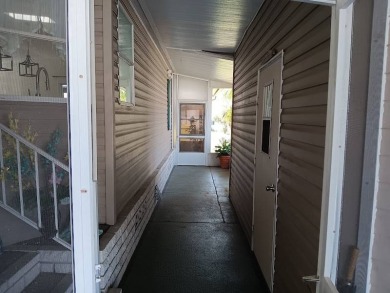 Furnished! Updated 2Bed/2Bath well-maintained Home with a on Four Lakes Golf Club in Florida - for sale on GolfHomes.com, golf home, golf lot