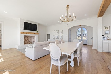 Located in the prestigious gated community of Le Triomphe Golf & on LeTriomphe Golf and Country Club in Louisiana - for sale on GolfHomes.com, golf home, golf lot