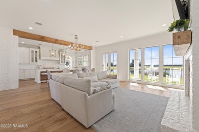 Located in the prestigious gated community of Le Triomphe Golf & on LeTriomphe Golf and Country Club in Louisiana - for sale on GolfHomes.com, golf home, golf lot