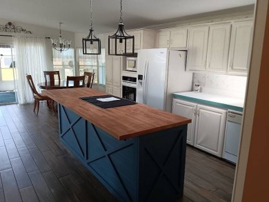 Furnished! Updated 2Bed/2Bath well-maintained Home with a on Four Lakes Golf Club in Florida - for sale on GolfHomes.com, golf home, golf lot