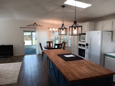 Furnished! Updated 2Bed/2Bath well-maintained Home with a on Four Lakes Golf Club in Florida - for sale on GolfHomes.com, golf home, golf lot