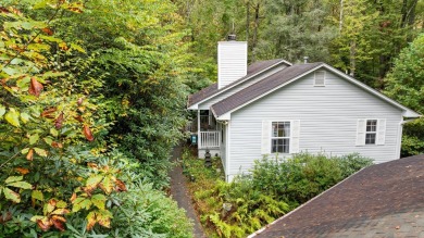 Move-in ready and fully furnished, this charming single-level on Sapphire National Golf Club in North Carolina - for sale on GolfHomes.com, golf home, golf lot