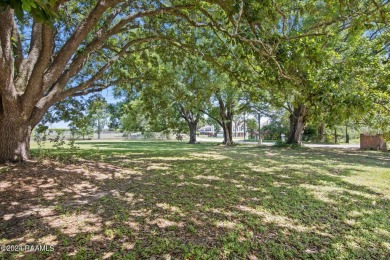 Beautiful corner lot that backs up to Oakbourne Country Club on Oakbourne Country Club in Louisiana - for sale on GolfHomes.com, golf home, golf lot