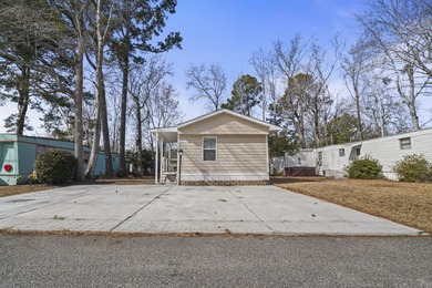 This one is all about the outside living! Huge deck and right on on Indian Wells Golf Course in South Carolina - for sale on GolfHomes.com, golf home, golf lot