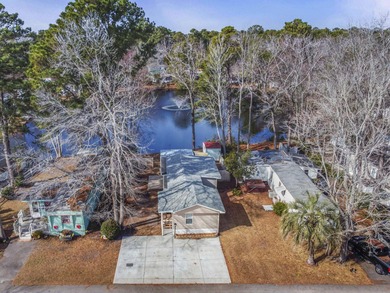 This one is all about the outside living! Huge deck and right on on Indian Wells Golf Course in South Carolina - for sale on GolfHomes.com, golf home, golf lot