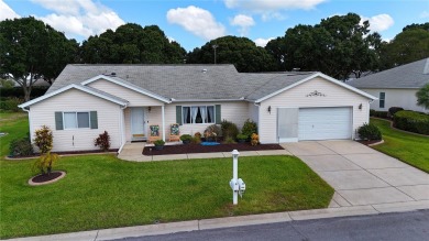Honey, stop the car!  Great curb appeal on this 2/2/2 on Eagle Ridge At Spruce Creek Country Club in Florida - for sale on GolfHomes.com, golf home, golf lot