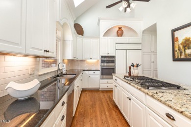 Experience luxury living where waterfront serenity meets golf on Country Club of Johnston County in North Carolina - for sale on GolfHomes.com, golf home, golf lot