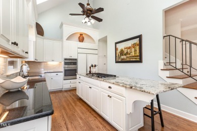 Experience luxury living where waterfront serenity meets golf on Country Club of Johnston County in North Carolina - for sale on GolfHomes.com, golf home, golf lot
