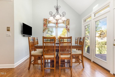 Experience luxury living where waterfront serenity meets golf on Country Club of Johnston County in North Carolina - for sale on GolfHomes.com, golf home, golf lot