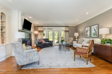 Experience luxury living where waterfront serenity meets golf on Country Club of Johnston County in North Carolina - for sale on GolfHomes.com, golf home, golf lot