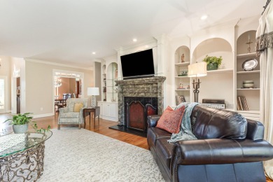 Experience luxury living where waterfront serenity meets golf on Country Club of Johnston County in North Carolina - for sale on GolfHomes.com, golf home, golf lot