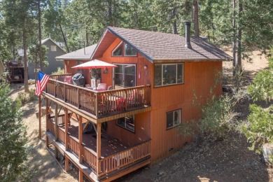 Close to everything fun is this cozy rustic family cabin nestled on Sequoia Woods Country Club in California - for sale on GolfHomes.com, golf home, golf lot