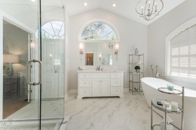 Experience luxury living where waterfront serenity meets golf on Country Club of Johnston County in North Carolina - for sale on GolfHomes.com, golf home, golf lot