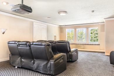 Experience luxury living where waterfront serenity meets golf on Country Club of Johnston County in North Carolina - for sale on GolfHomes.com, golf home, golf lot