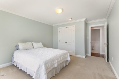 Experience luxury living where waterfront serenity meets golf on Country Club of Johnston County in North Carolina - for sale on GolfHomes.com, golf home, golf lot