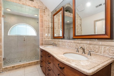 Experience luxury living where waterfront serenity meets golf on Country Club of Johnston County in North Carolina - for sale on GolfHomes.com, golf home, golf lot