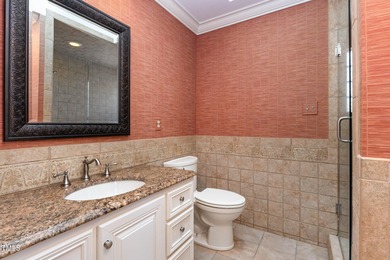 Experience luxury living where waterfront serenity meets golf on Country Club of Johnston County in North Carolina - for sale on GolfHomes.com, golf home, golf lot