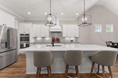 Welcome to this stunning 3,475 sq ft home nestled on a on Traditions of Braselton Golf Club in Georgia - for sale on GolfHomes.com, golf home, golf lot