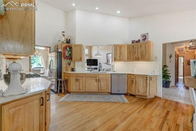 Custom-built ranch home nestled on a private 1+ acre lot w/easy on Shining Mountain Golf Club in Colorado - for sale on GolfHomes.com, golf home, golf lot