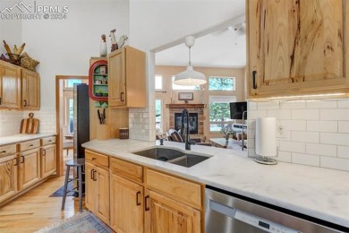 Custom-built ranch home nestled on a private 1+ acre lot w/easy on Shining Mountain Golf Club in Colorado - for sale on GolfHomes.com, golf home, golf lot