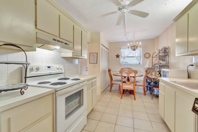 Step inside this beautiful, spacious 4th floor apartment and you on Poinciana Golf Club in Florida - for sale on GolfHomes.com, golf home, golf lot