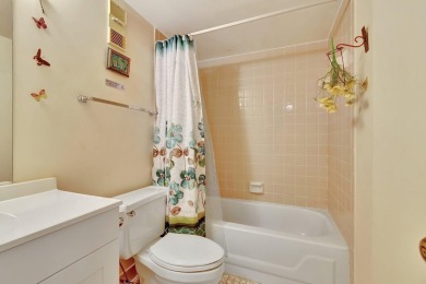 Step inside this beautiful, spacious 4th floor apartment and you on Poinciana Golf Club in Florida - for sale on GolfHomes.com, golf home, golf lot